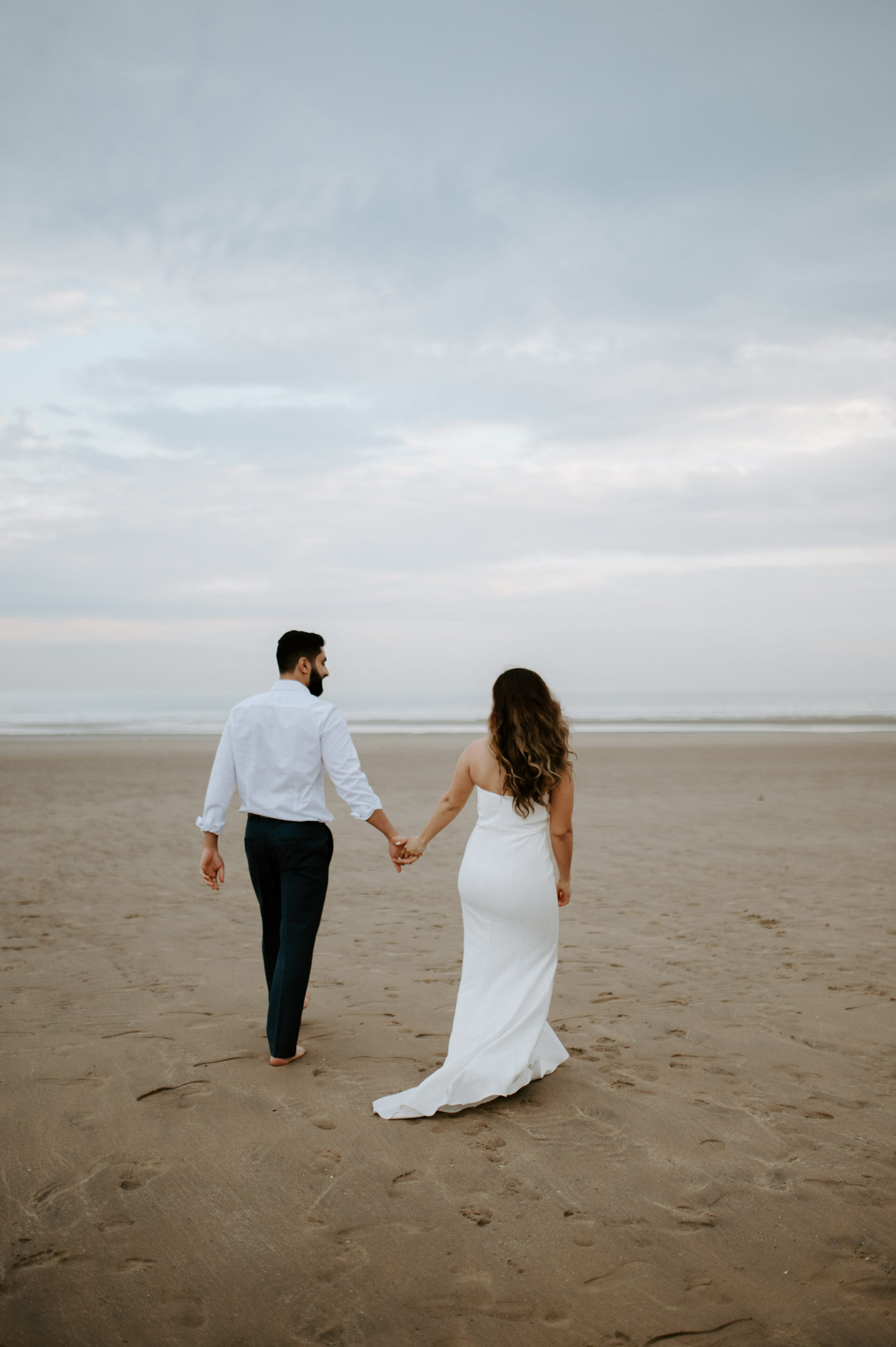 Demiana and Goergeuos - Camber Sands Golden Hour Beach Shoot - Laura Williams Photography-14.jpg