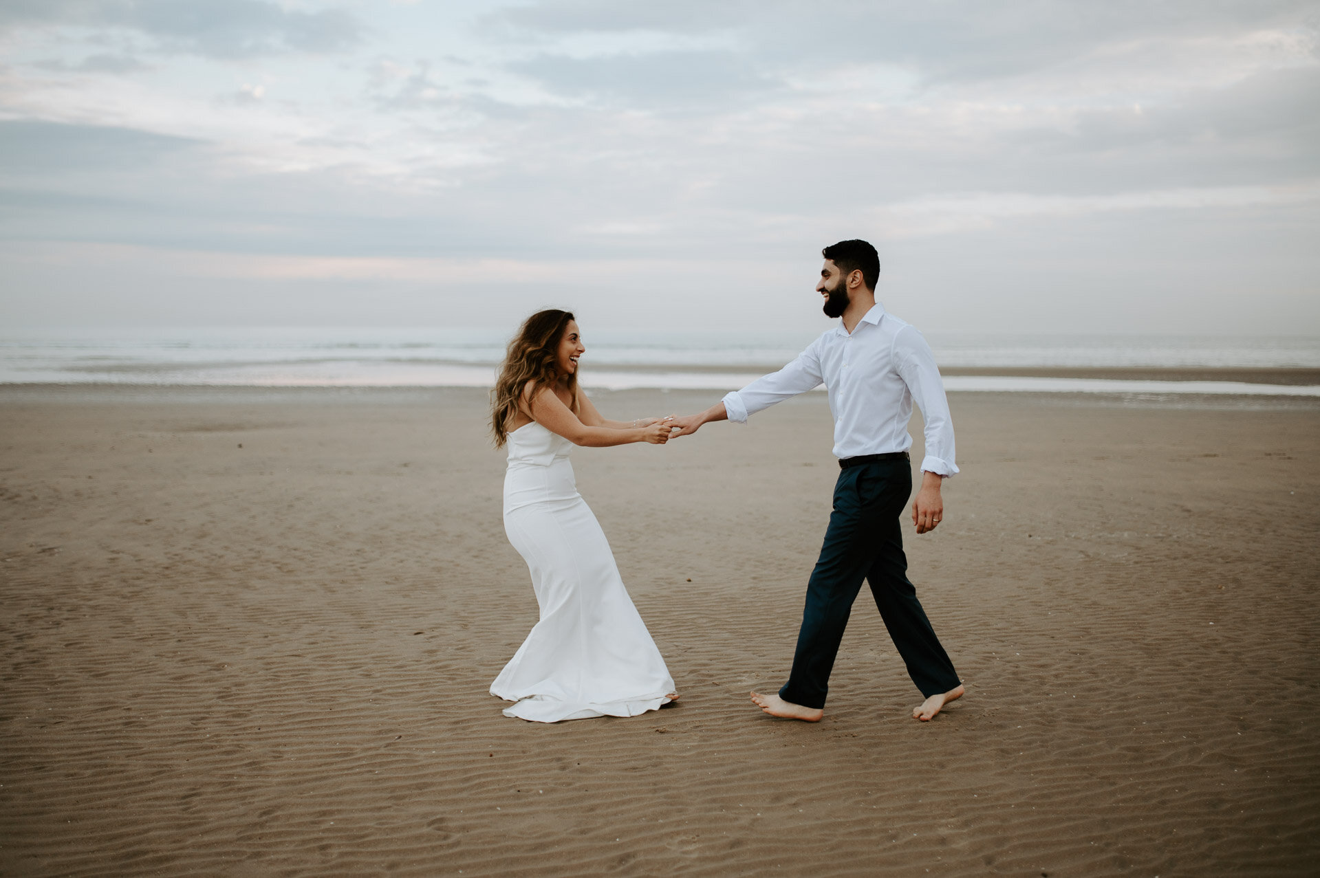 Demiana and Goergeuos - Camber Sands Golden Hour Beach Shoot - Laura Williams Photography-17.jpg