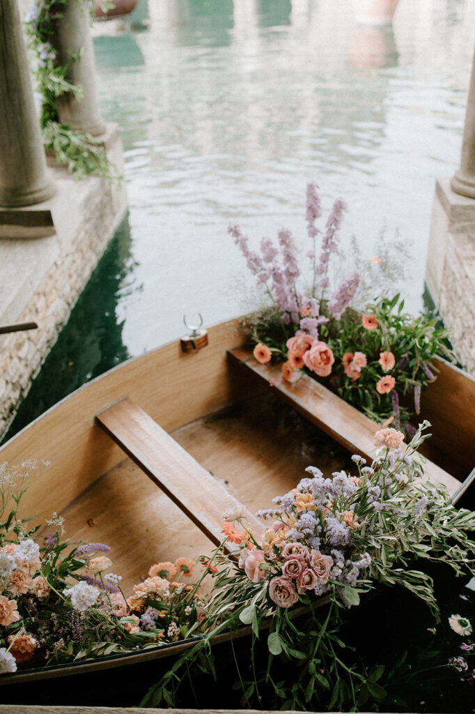 wooden rowing boat with flowers at euridge manor