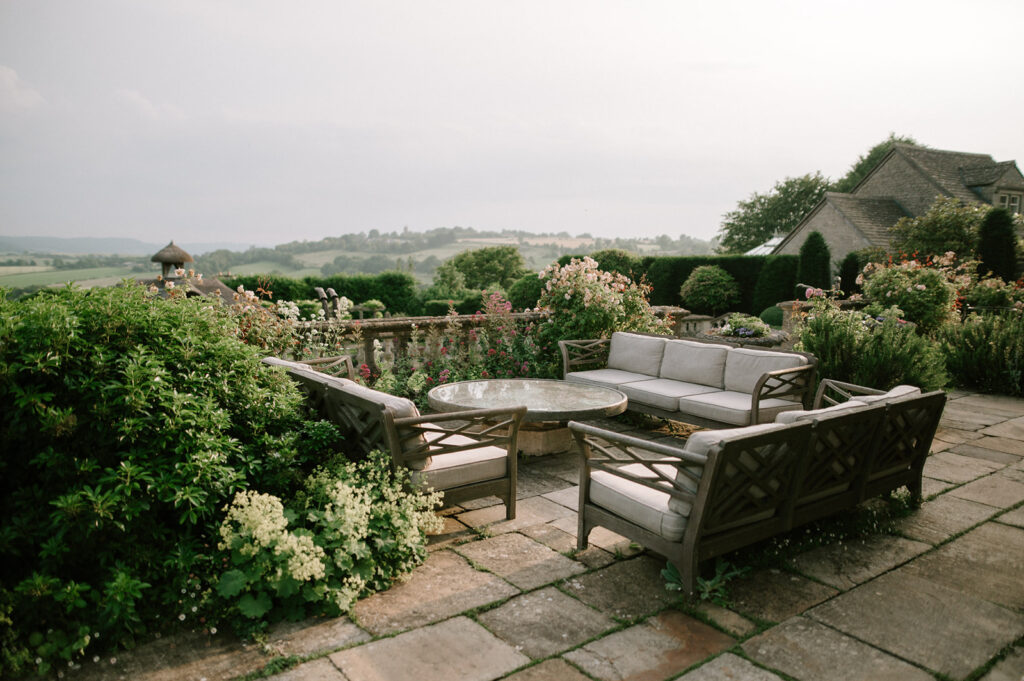 seating area at euridge manor with views of cotswolds