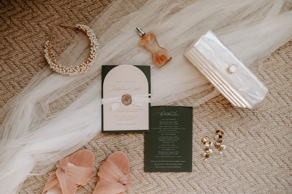 flat lay with wedding stationery suite