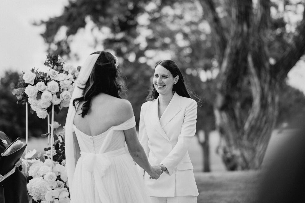 two brides sharing vows