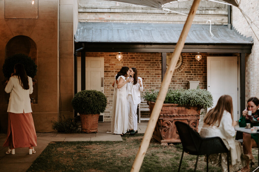brides having quiet intimate moment during wedding reception