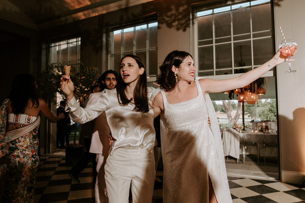 brides dancing with cocktail
