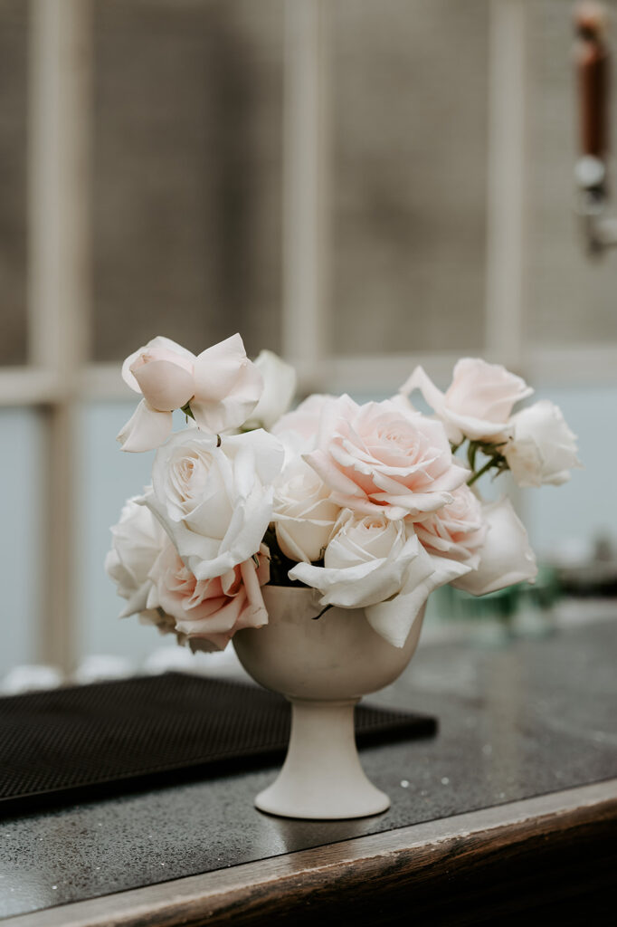 vase of blush pink reflexed roses