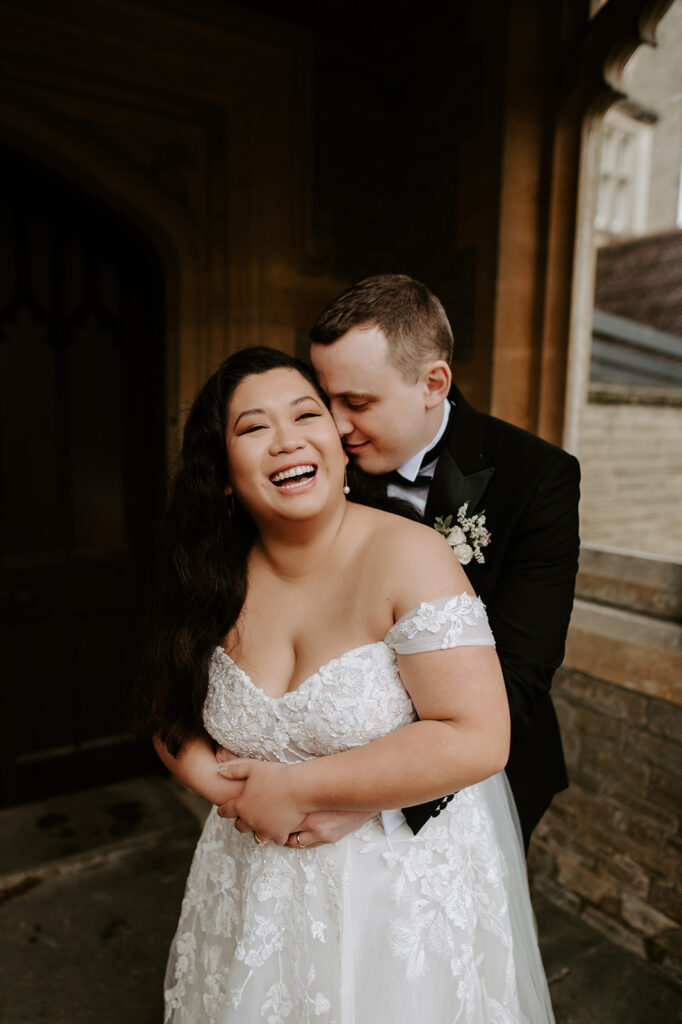bride and groom embracing at tortworth court